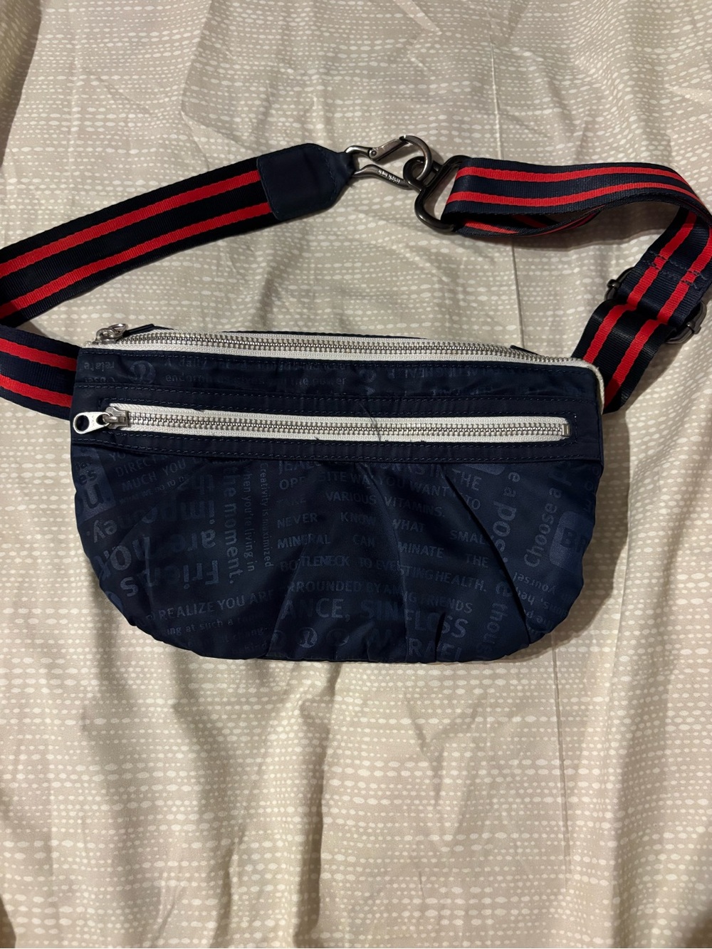 lululemon athletica Navy Text-Print Crossbody Bag with Red-Black Striped Strap